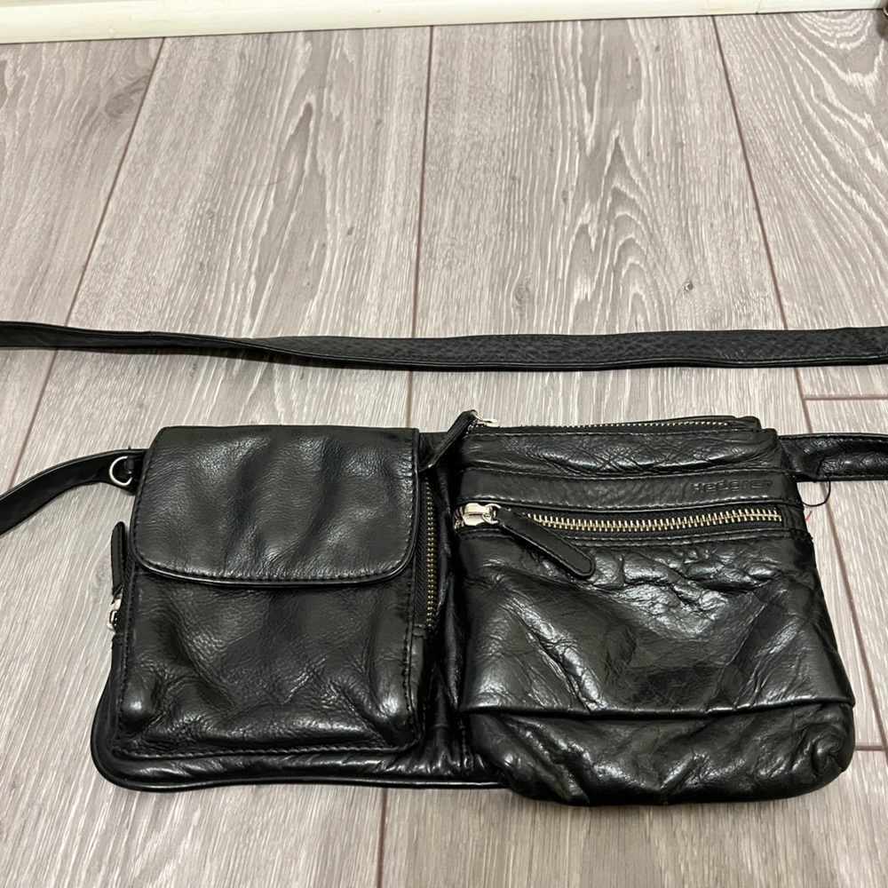 Roots cross body bag